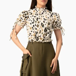 Blusa estampada cuello alto