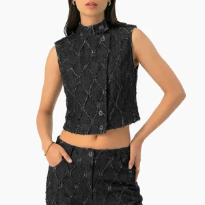Chaleco denim con destruccion