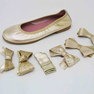 Bailarinas doradas con adornos lazo