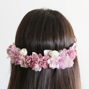 Corona ceremonia niña tonos rosa palo malva
