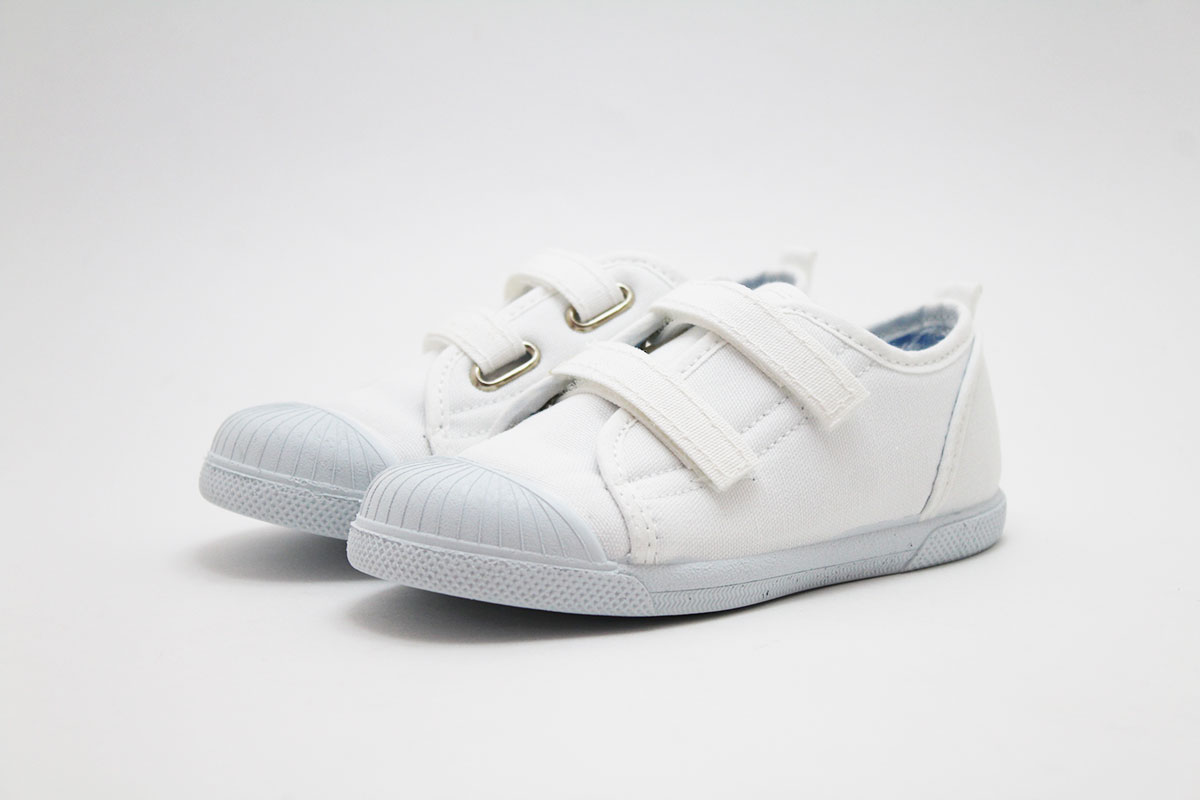 Zapatillas blancas lona cierre adherente y puntera