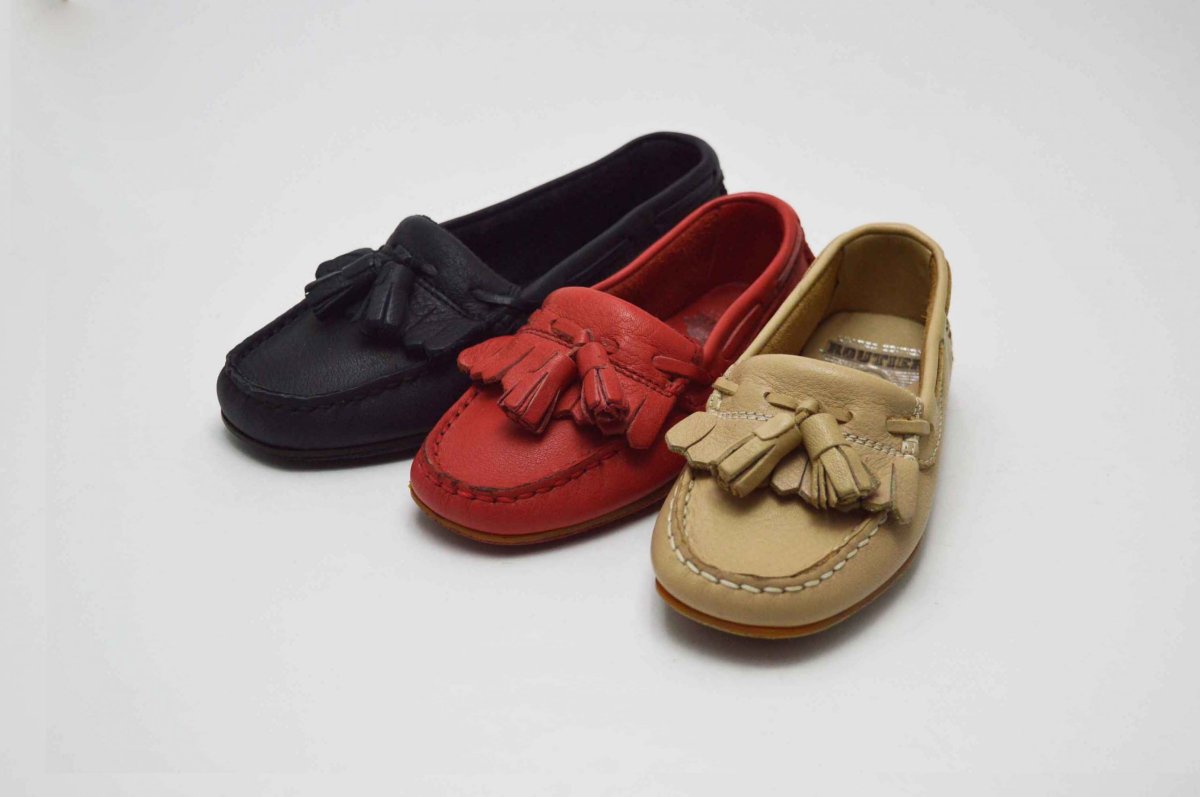 Mocasín Martinelli borlas niño niña