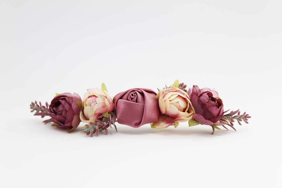 Pasador flores tonos rosa palo niña