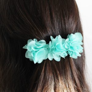 Pasador clip flores aguamarina niña