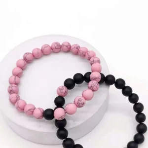 Par de pulseras para pareja rosa y negro
