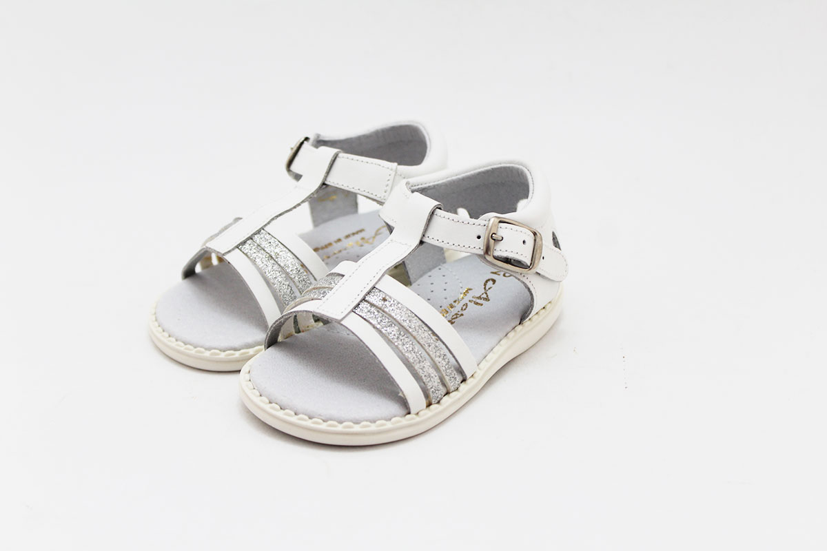 Sandalia niña blanca glitter plata hebilla